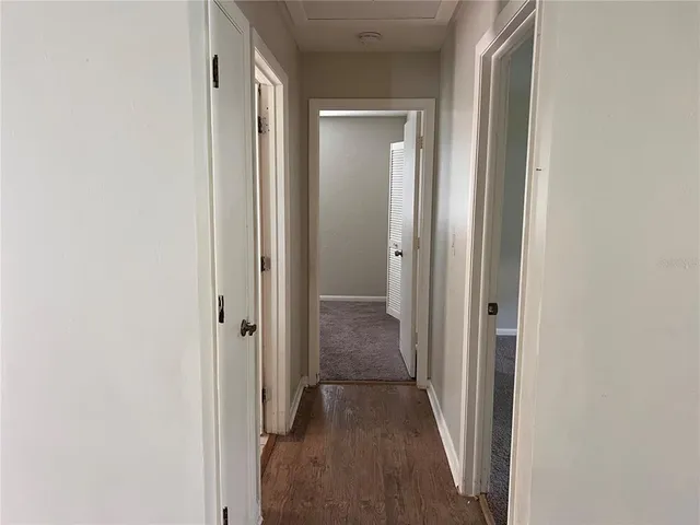 a view of a bathroom from the hallway