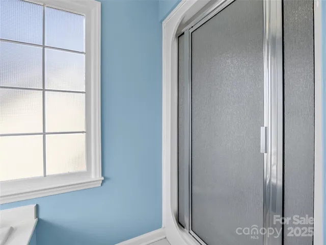 a view of a bathroom with a window