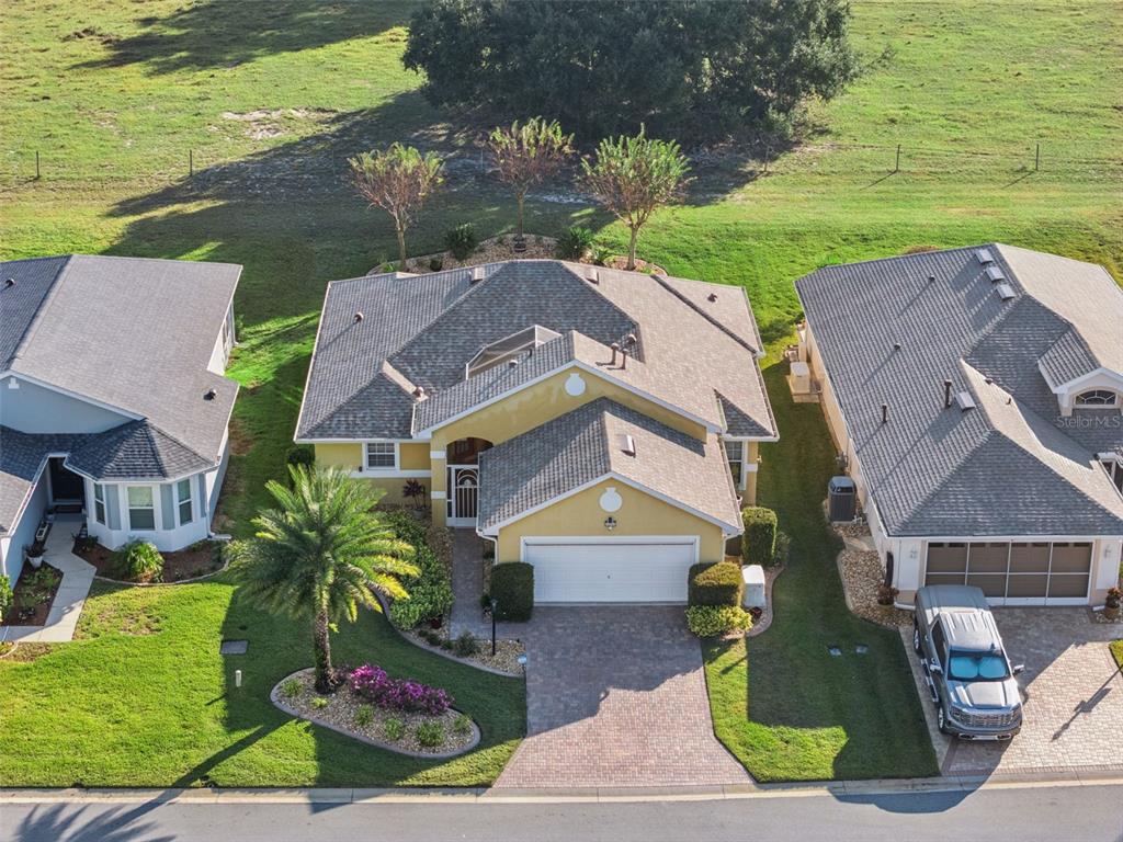 20642 Prince Ranier Place Leesburg, FL 34748 - Photo 23 of 59 an aerial view of a house