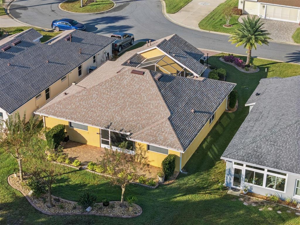 20642 Prince Ranier Place Leesburg, FL 34748 - Photo 24 of 59 an aerial view of a house with a yard