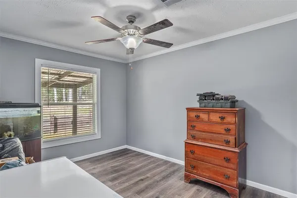 a view of room with workspace and a window
