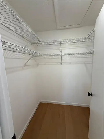 a view of a room with racks on the wall