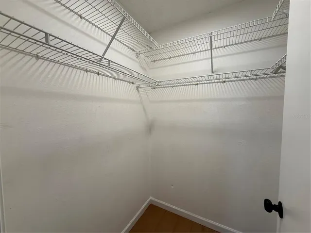 a view of a room with racks on the wall