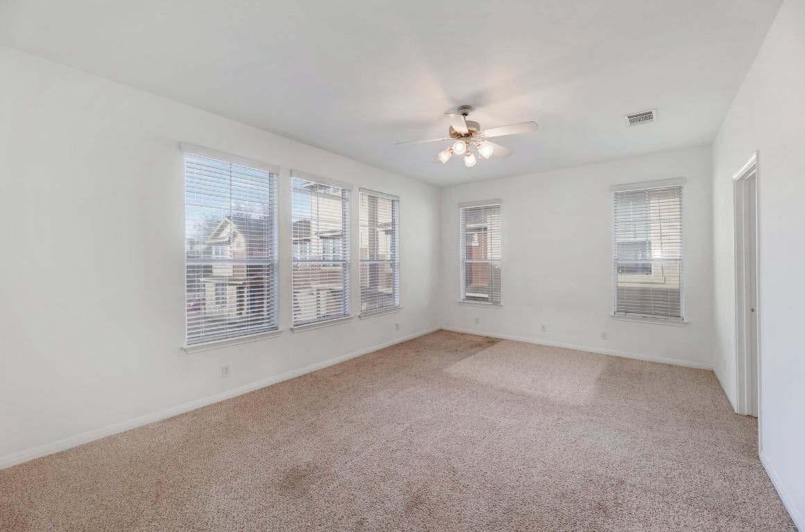 710 Franklin Boulevard, Unit C Austin, TX 78751 - Photo 12 of 29 a view of an empty room with a window