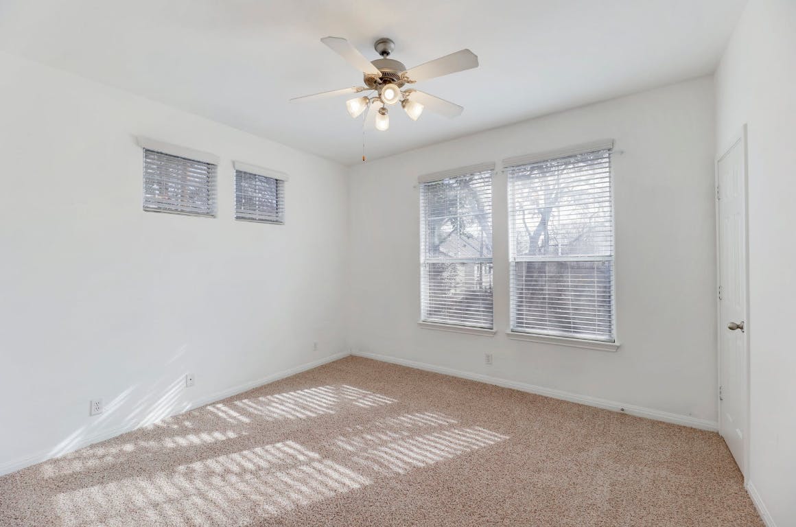 710 Franklin Boulevard, Unit C Austin, TX 78751 - Photo 19 of 29 a view of an empty room with a window