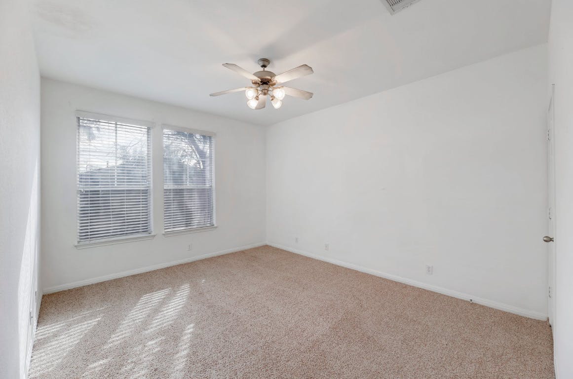 710 Franklin Boulevard, Unit C Austin, TX 78751 - Photo 21 of 29 a view of an empty room with a window
