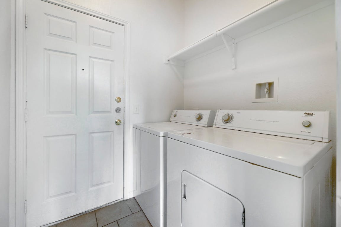 710 Franklin Boulevard, Unit C Austin, TX 78751 - Photo 23 of 29 a utility room with dryer and washer