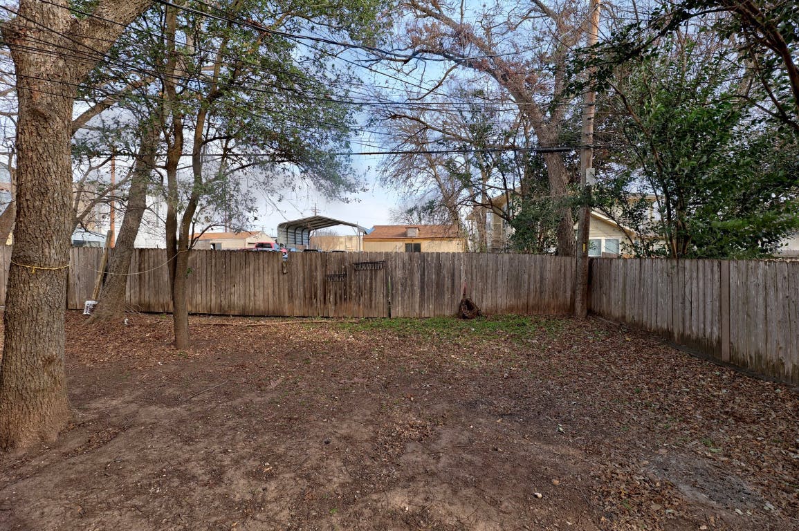 710 Franklin Boulevard, Unit C Austin, TX 78751 - Photo 25 of 29 a view of backyard with tree
