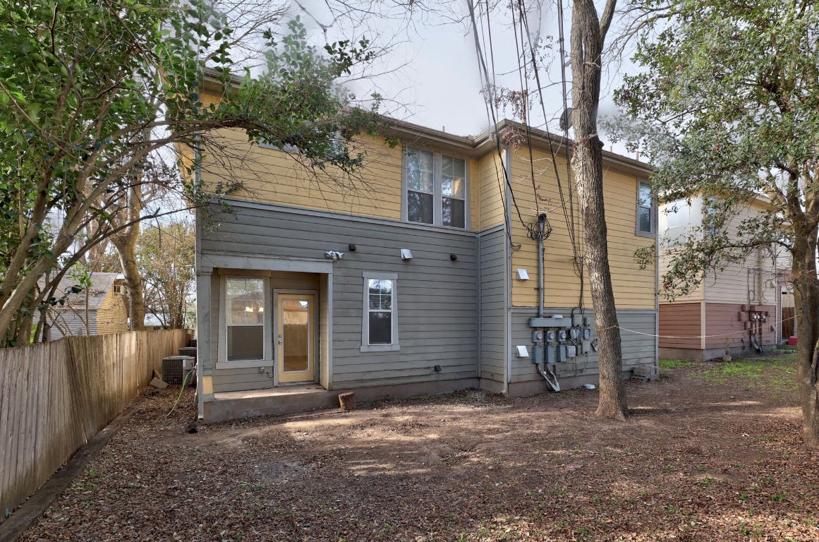710 Franklin Boulevard, Unit C Austin, TX 78751 - Photo 26 of 29 a view of a house with a yard