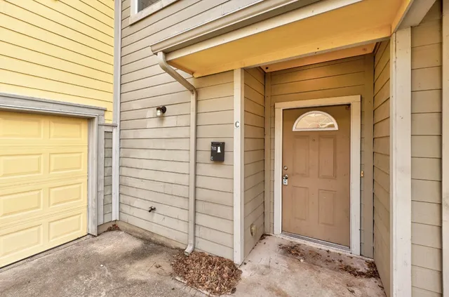 a view of front door and a window