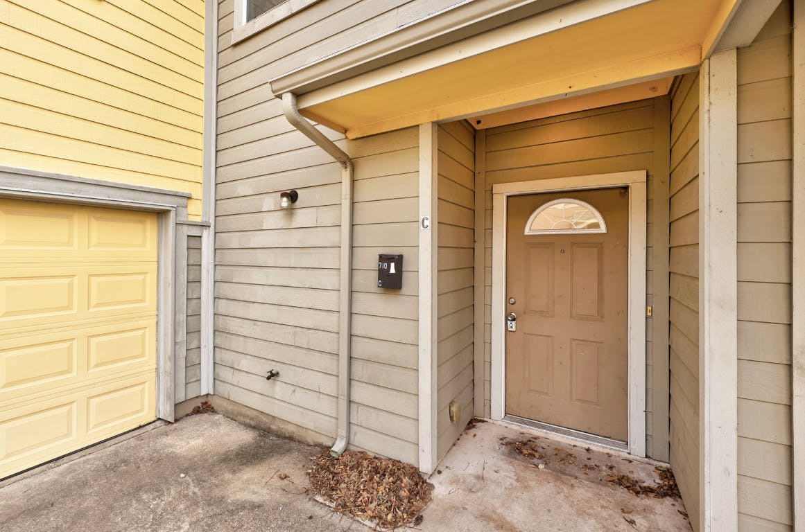 710 Franklin Boulevard, Unit C Austin, TX 78751 - Photo 4 of 29 a view of front door and a window