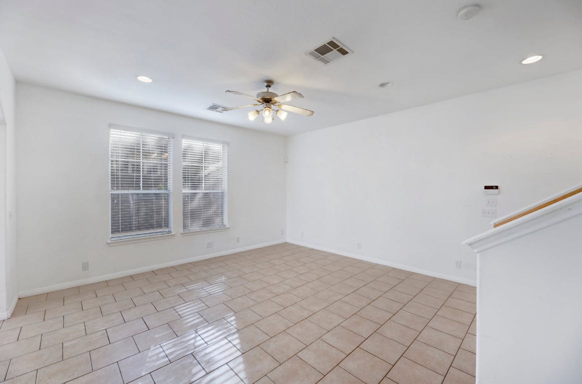 710 Franklin Boulevard, Unit C Austin, TX 78751 - Photo 8 of 29 a view of an empty room with a window