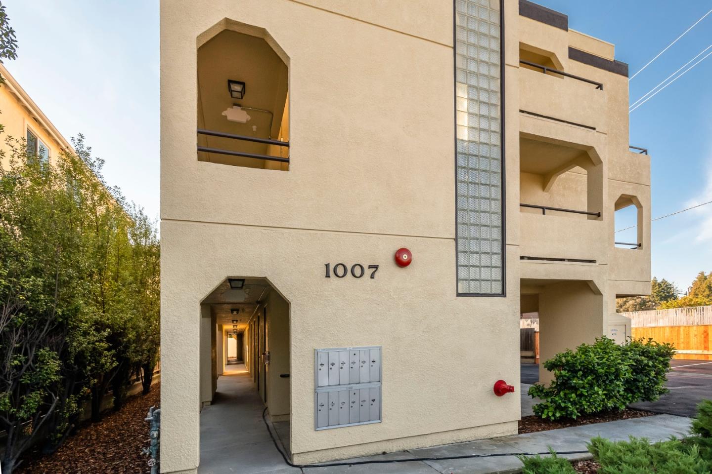 1007 Hemlock Avenue Millbrae, CA 94030 - Photo 2 of 34 a front view of a house with a garage