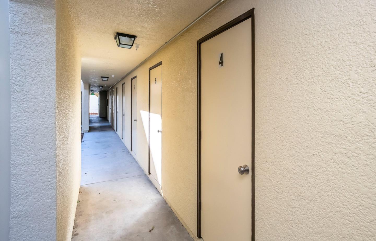 1007 Hemlock Avenue Millbrae, CA 94030 - Photo 21 of 34 a view of a hallway with wooden floor