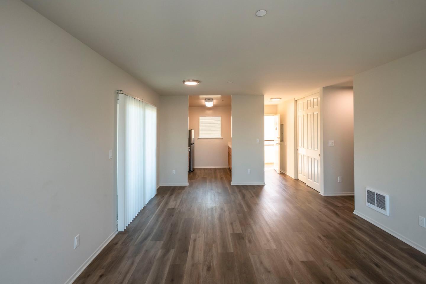 1007 Hemlock Avenue Millbrae, CA 94030 - Photo 6 of 34 a view of a hallway with wooden floor