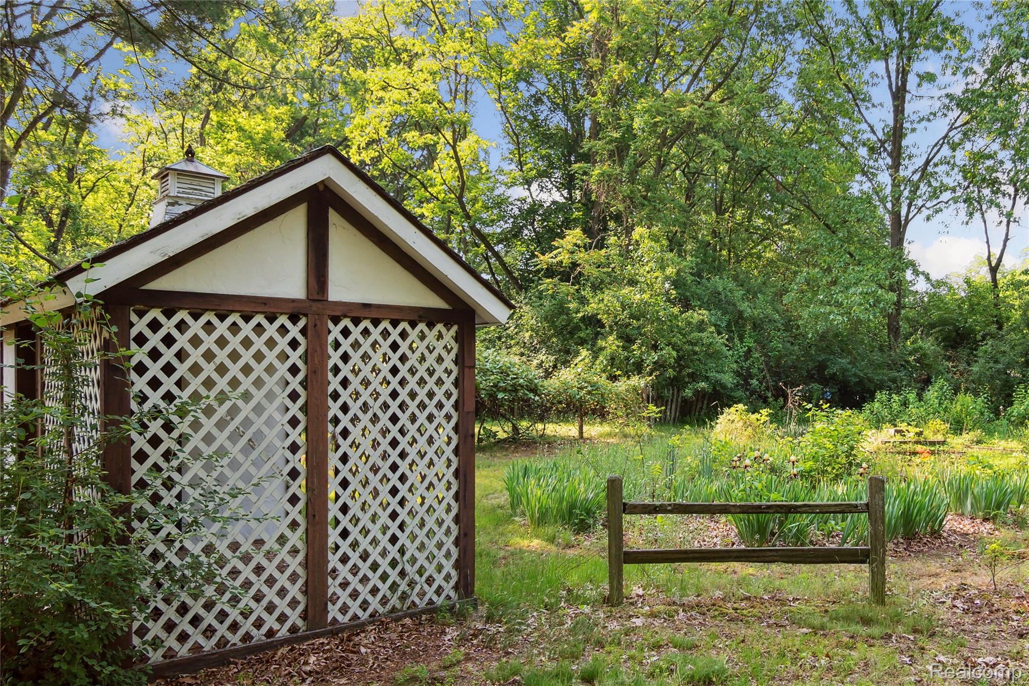 4300 West Bacon Road Hillsdale, MI 49242 - Photo 44 of 49 Pretty Perenial and Vegetable Garden