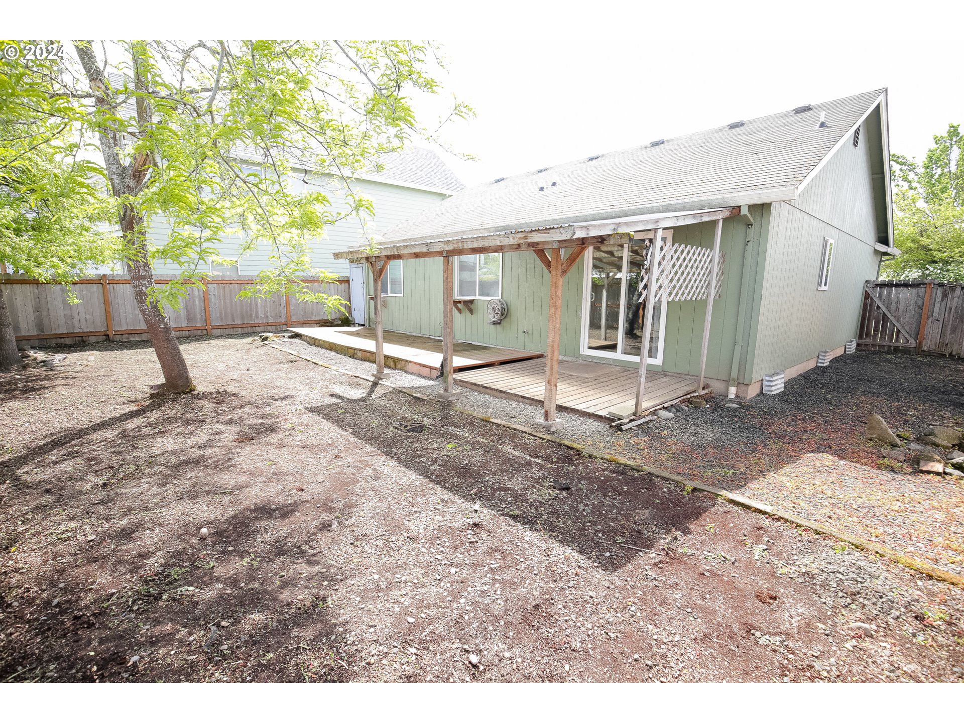 4112 South E Street Springfield, OR 97478 - Photo 20 of 21 a backyard of a house with barbeque oven