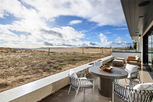 a view of a balcony with lake view