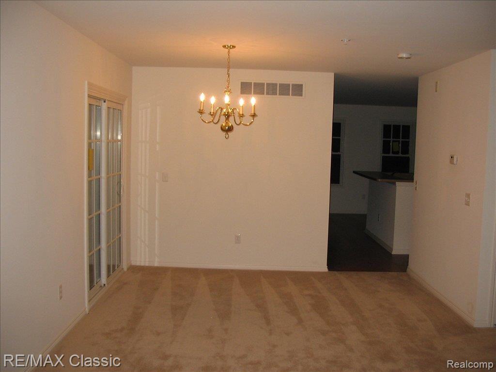 50107 Harding Street, Unit 117 Canton, MI 48188 - Photo 10 of 10 Dining Room, Doorwall to Balcony
