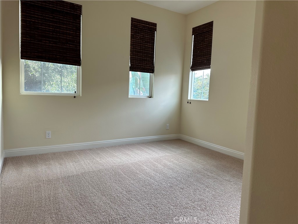 219 Wicker Irvine, CA 92618 - Photo 14 of 19 an empty room with windows