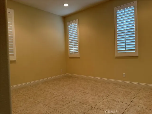 a kitchen with stainless steel appliances a sink and a refrigerator