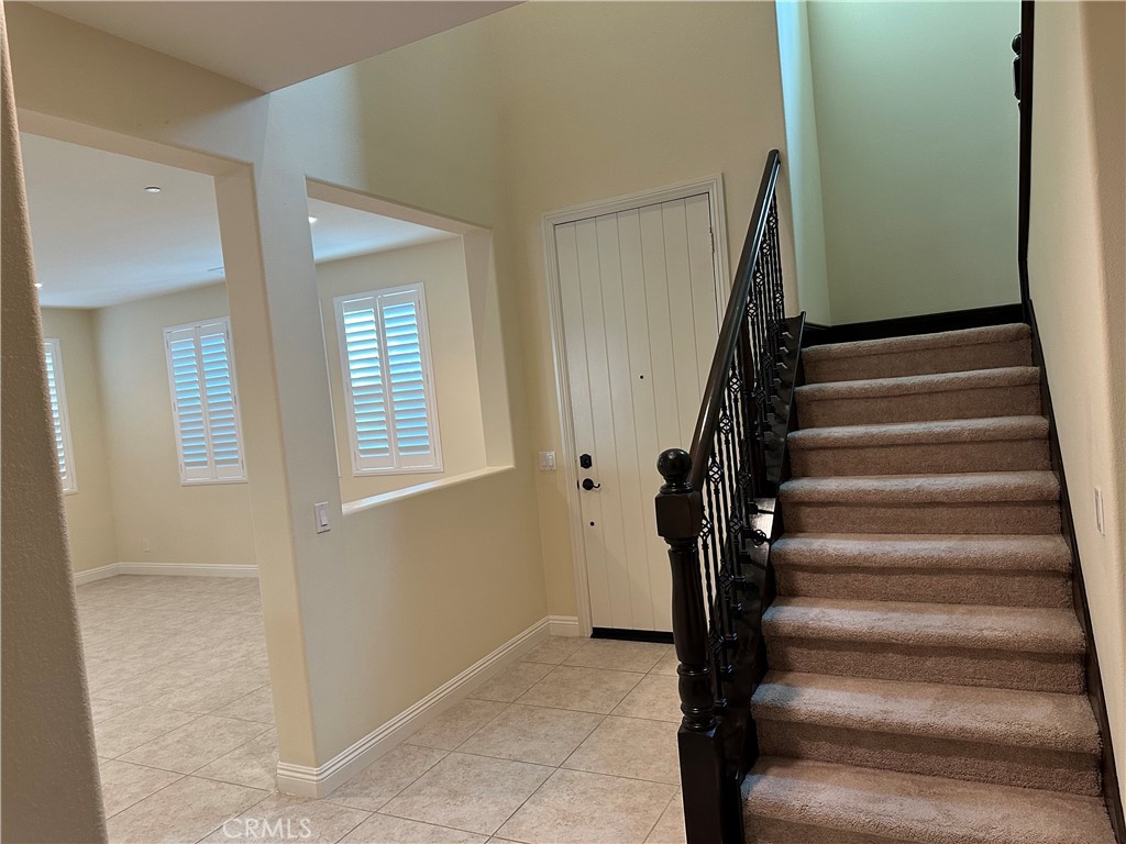 219 Wicker Irvine, CA 92618 - Photo 2 of 19 a view of an entryway with staircase