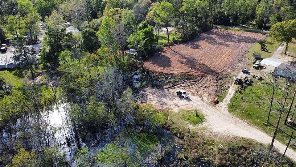 an aerial view of residential house with outdoor space
