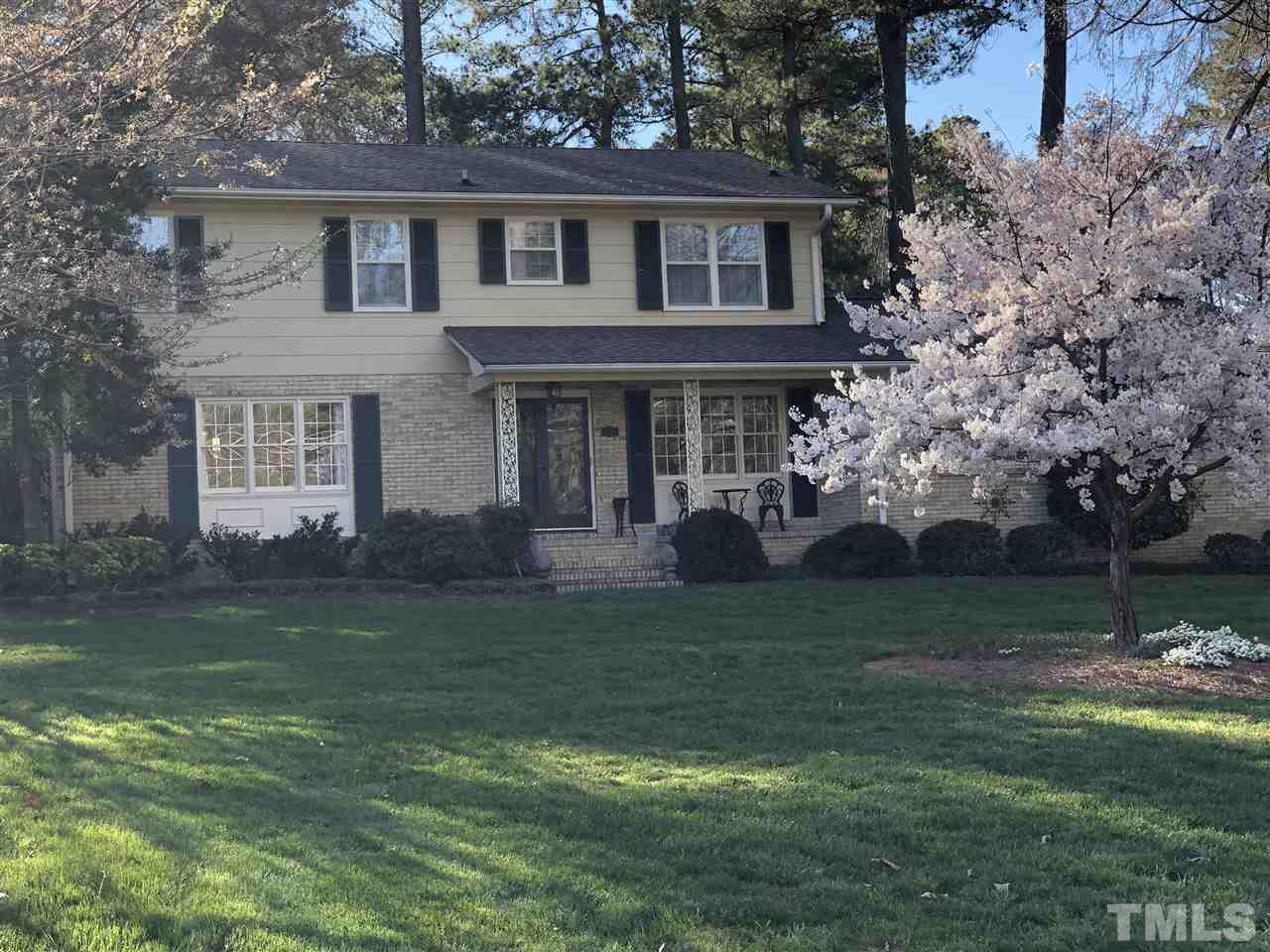 3907 Converse Drive Raleigh, NC 27609 - Photo 1 of 30 a view of a house with a yard