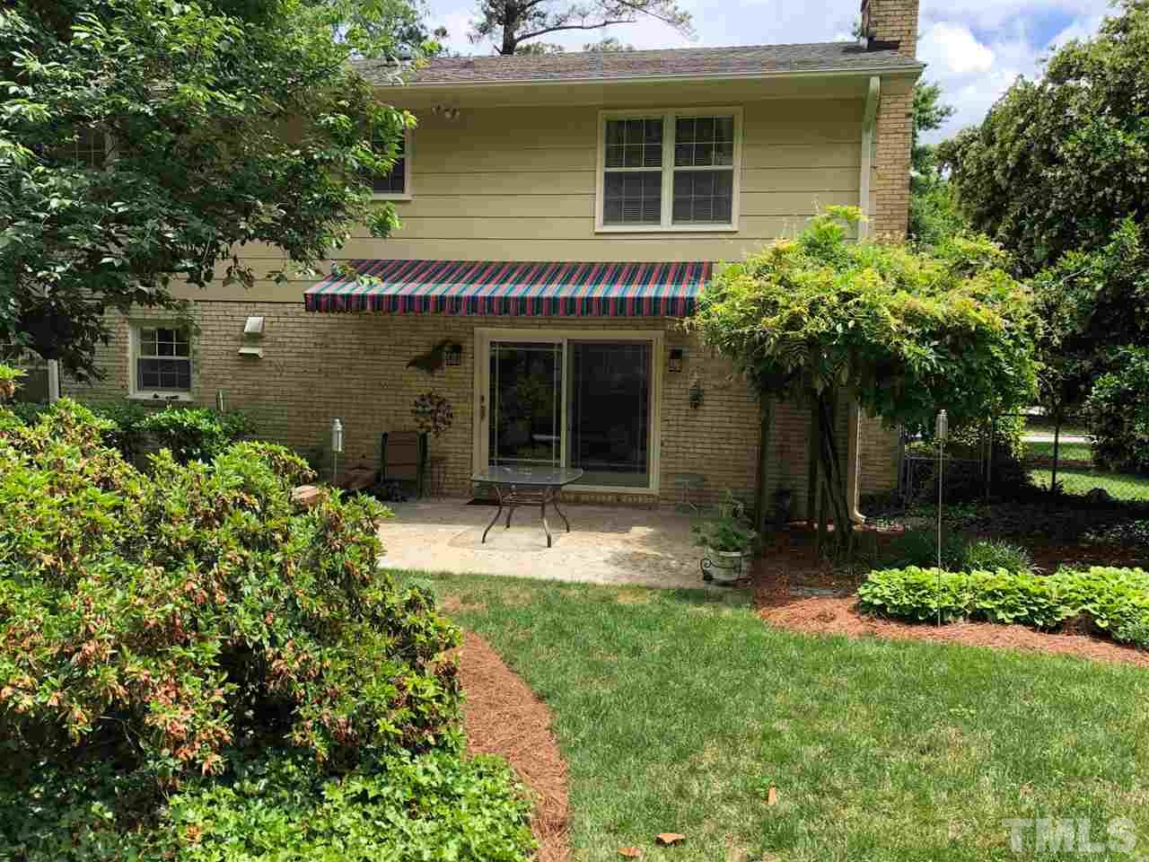3907 Converse Drive Raleigh, NC 27609 - Photo 28 of 30 front view of a house with a yard