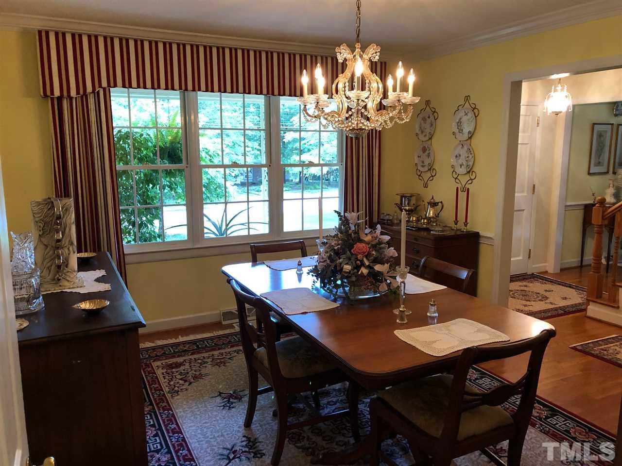 3907 Converse Drive Raleigh, NC 27609 - Photo 5 of 30 a view of a dining room with furniture window and outside view