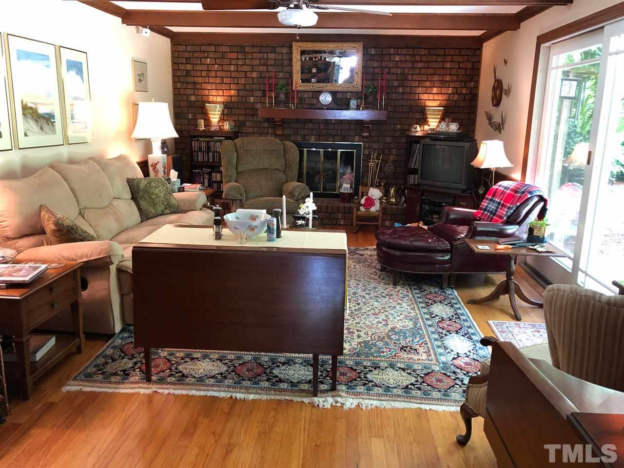 3907 Converse Drive Raleigh, NC 27609 - Photo 6 of 30 a living room filled with furniture