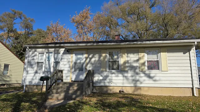 a view of swimming pool with outdoor seating