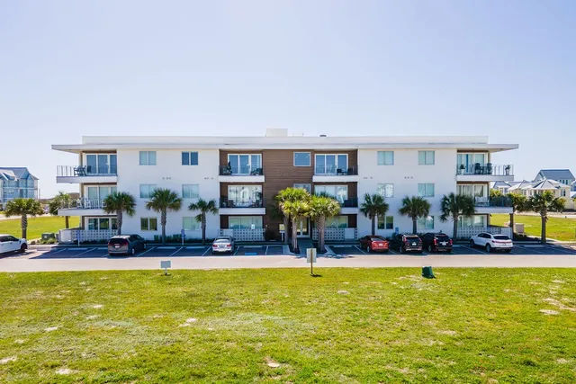 a swimming pool with outdoor seating