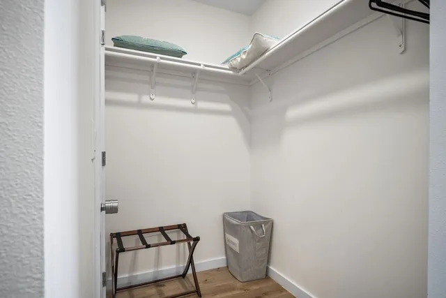 a view of a room with rack on the wall