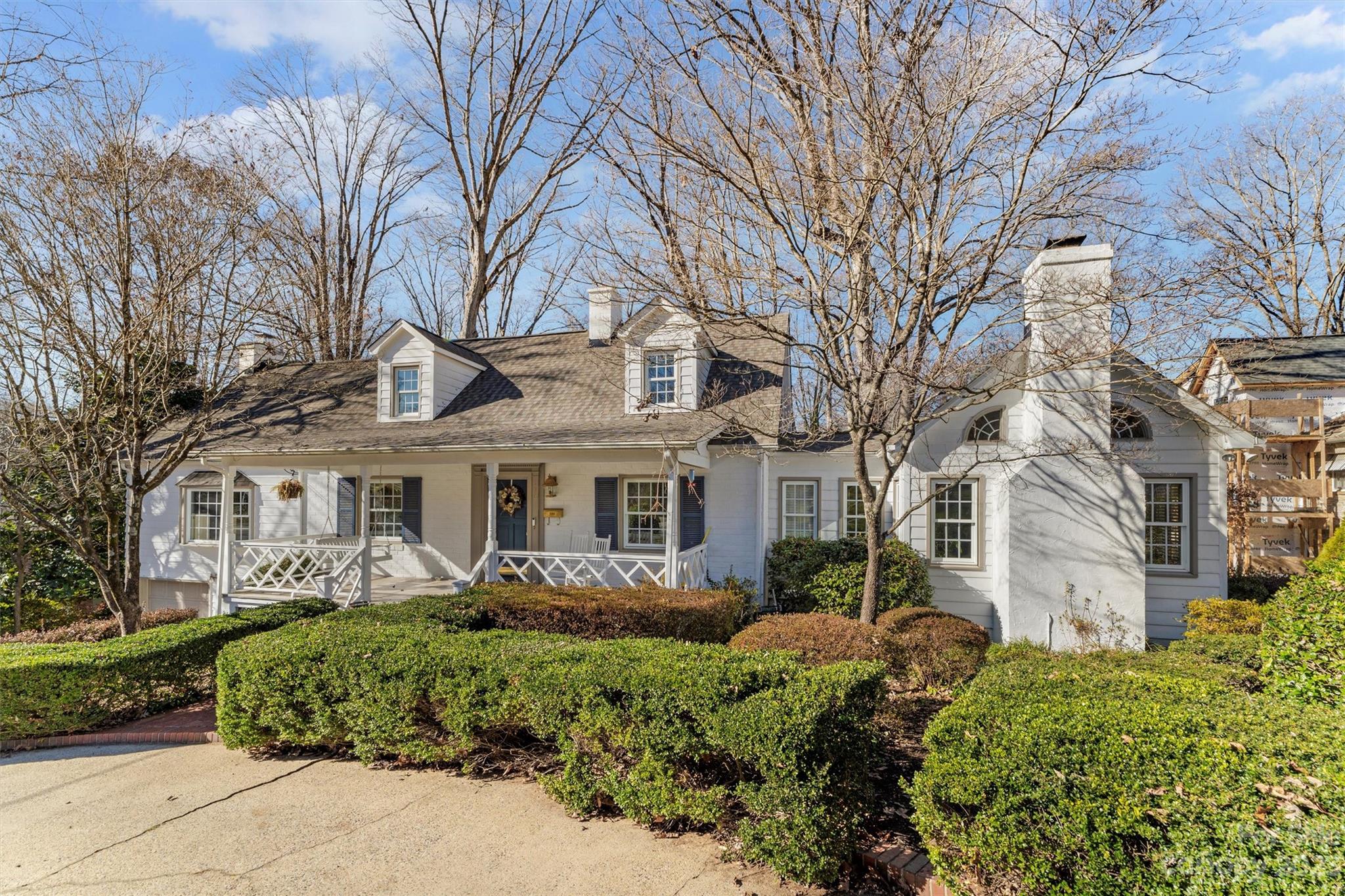 front view of a house with a garden