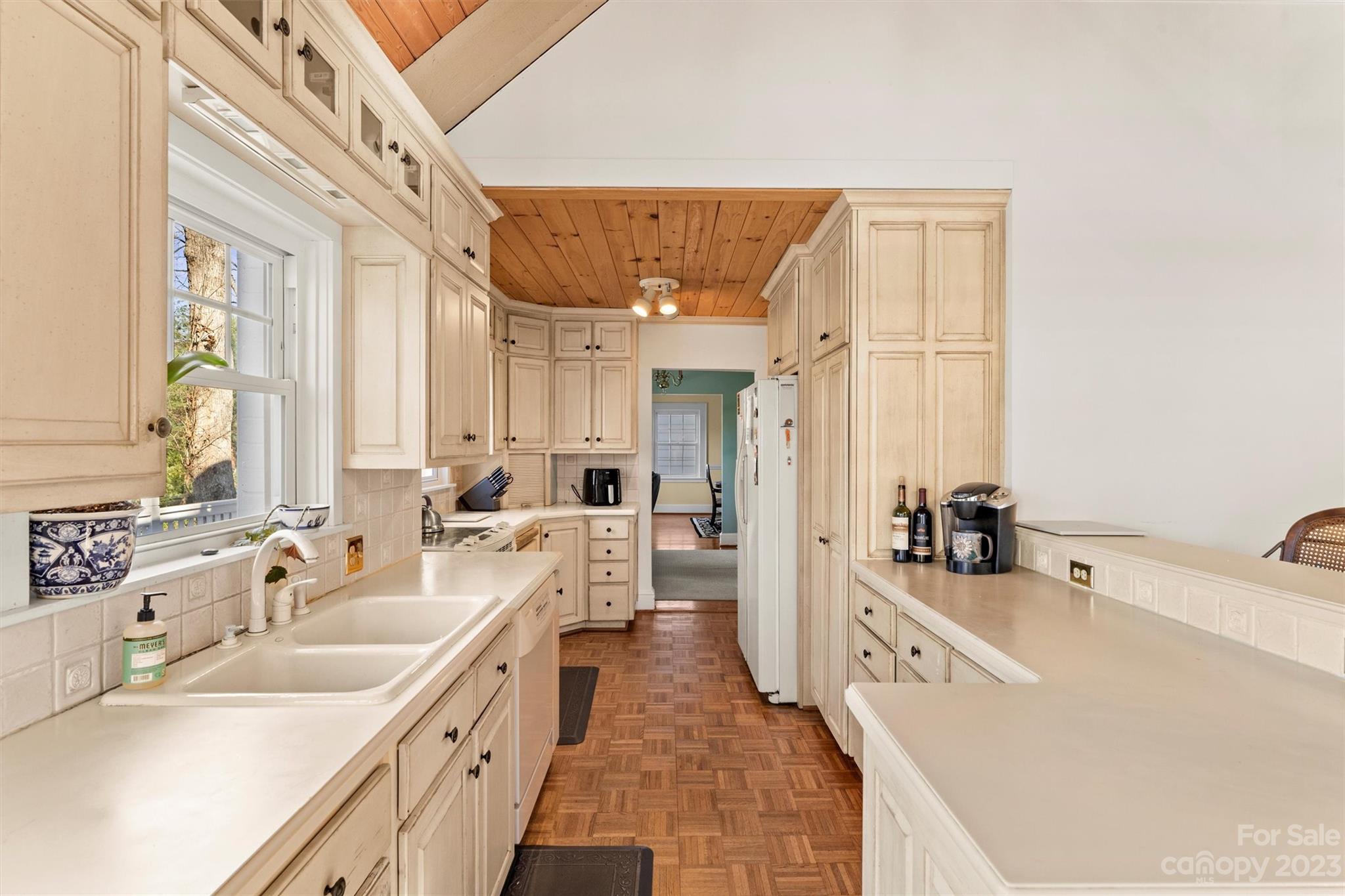116 Riverside Court Morganton, NC 28655 - Photo 11 of 40 a large white kitchen with a large window