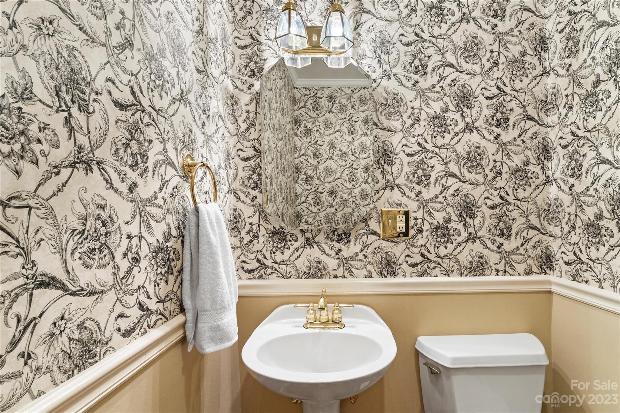 116 Riverside Court Morganton, NC 28655 - Photo 19 of 40 a bathroom with a toilet and a sink