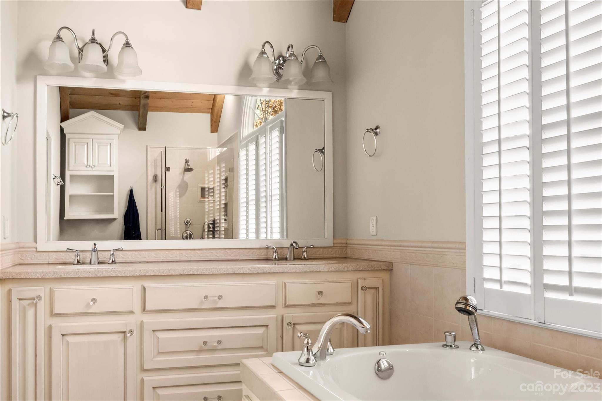 116 Riverside Court Morganton, NC 28655 - Photo 22 of 40 a bathroom with a sink and a mirror