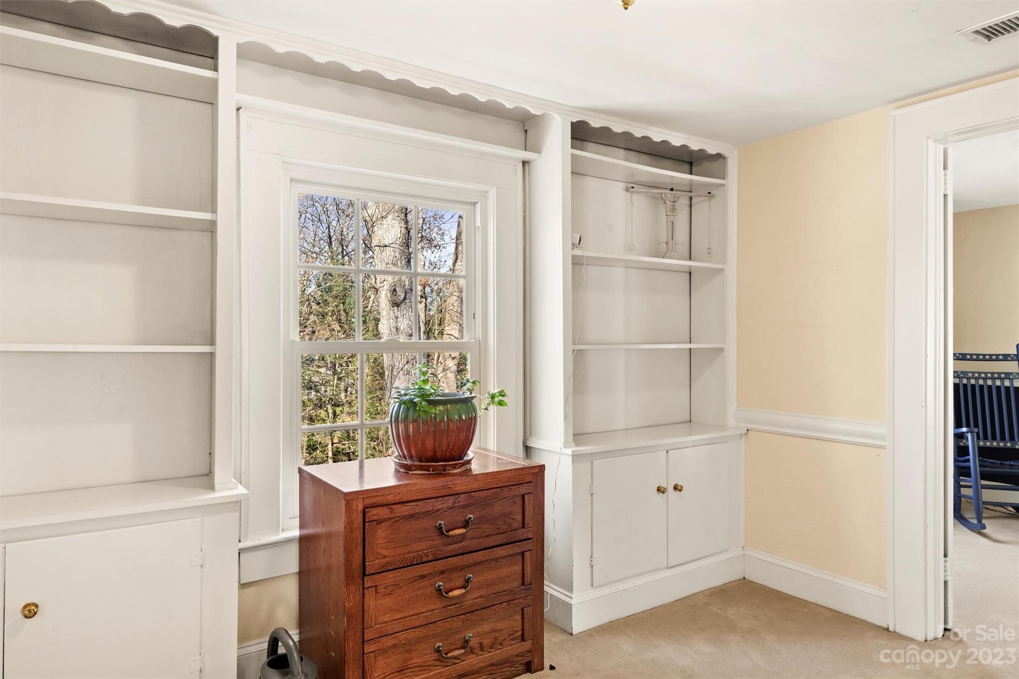 116 Riverside Court Morganton, NC 28655 - Photo 26 of 40 a room with a furniture and a window