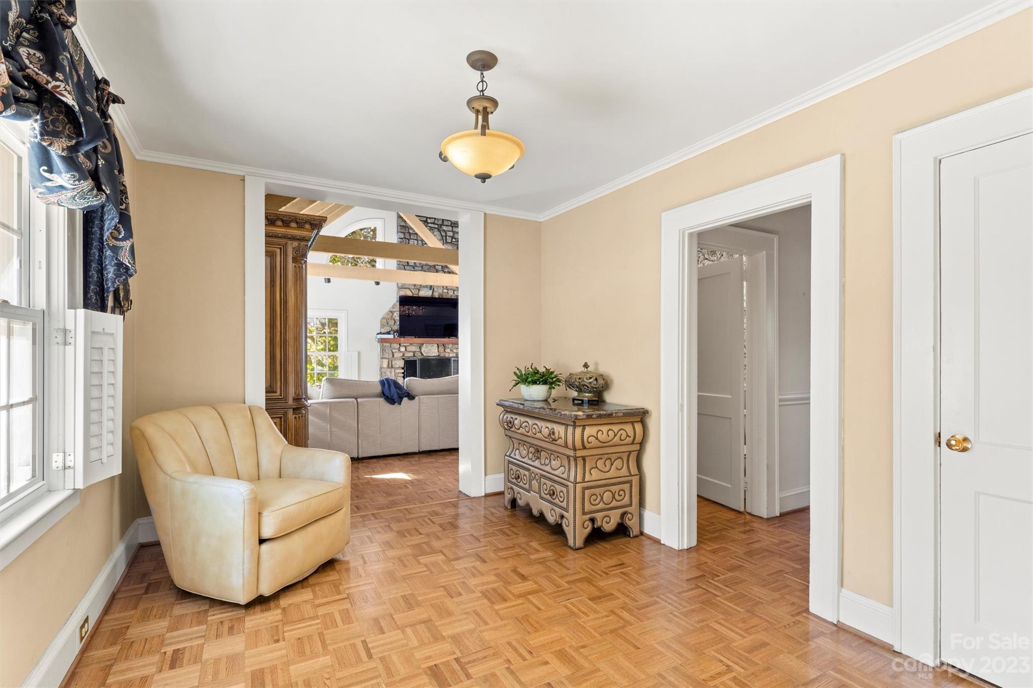 116 Riverside Court Morganton, NC 28655 - Photo 3 of 40 a living room with furniture and a chandelier