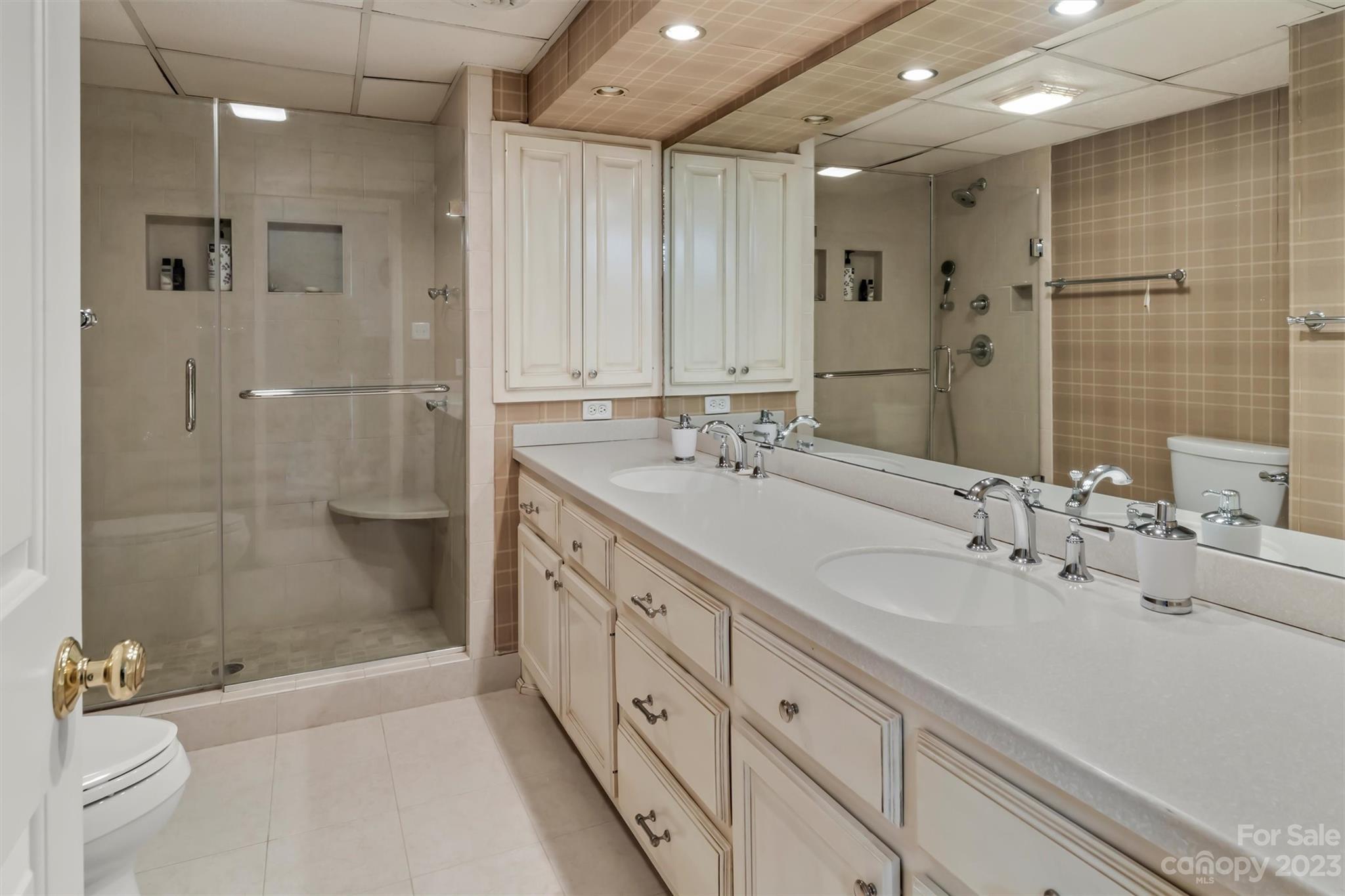 116 Riverside Court Morganton, NC 28655 - Photo 31 of 40 a spacious bathroom with double sink and a shower
