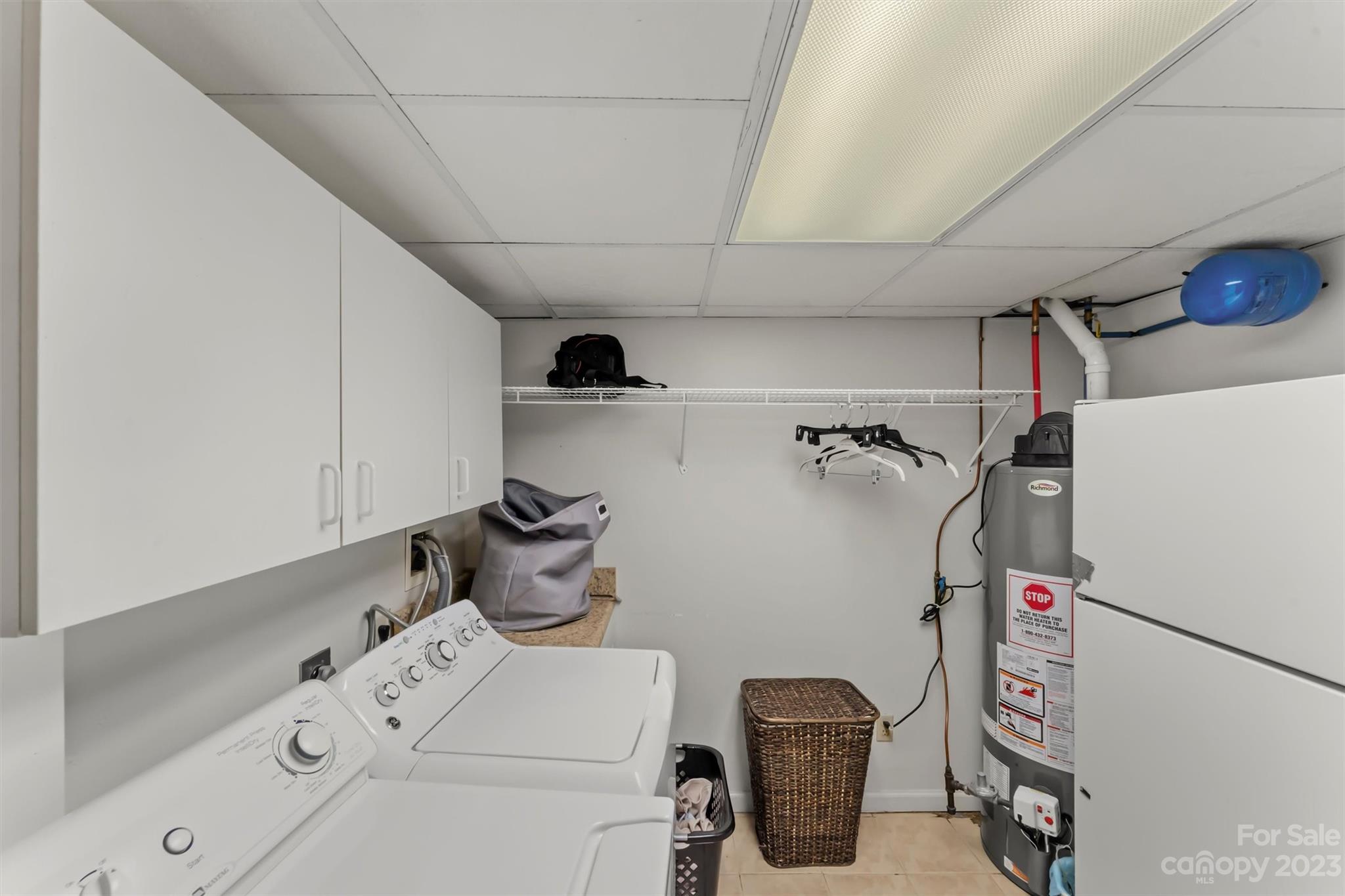 116 Riverside Court Morganton, NC 28655 - Photo 32 of 40 a utility room with dryer and washer