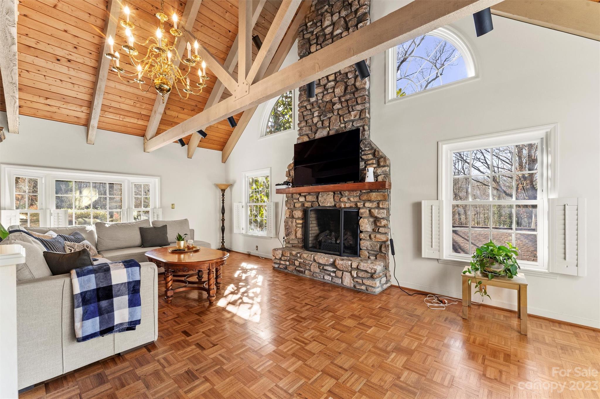 116 Riverside Court Morganton, NC 28655 - Photo 7 of 40 a living room with furniture a flat screen tv and a fireplace