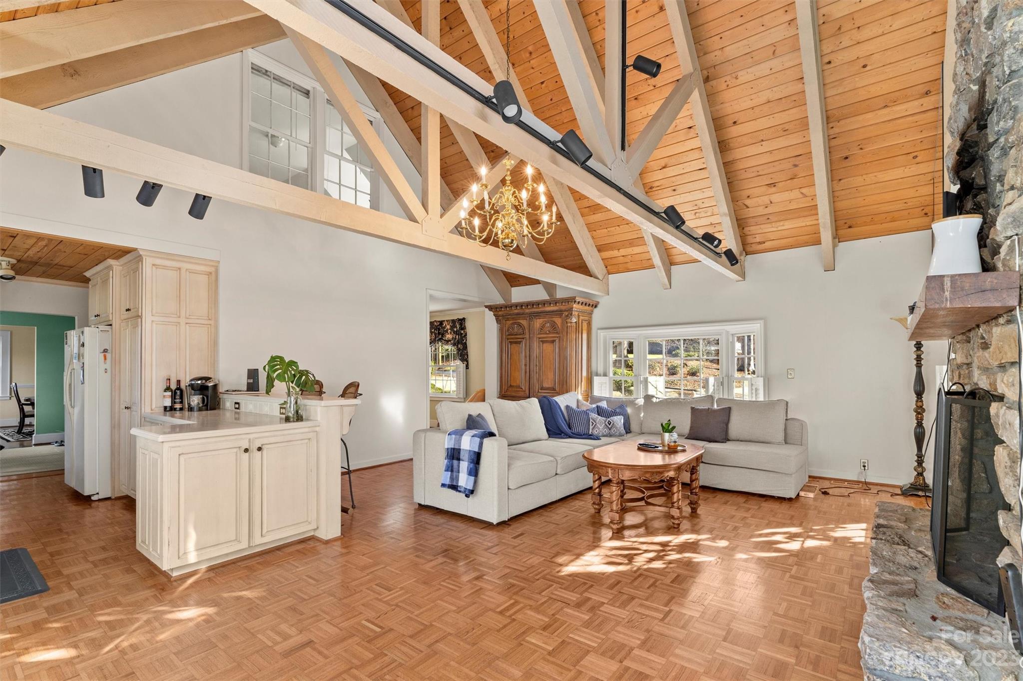 116 Riverside Court Morganton, NC 28655 - Photo 9 of 40 a living room with furniture a fireplace and a large window