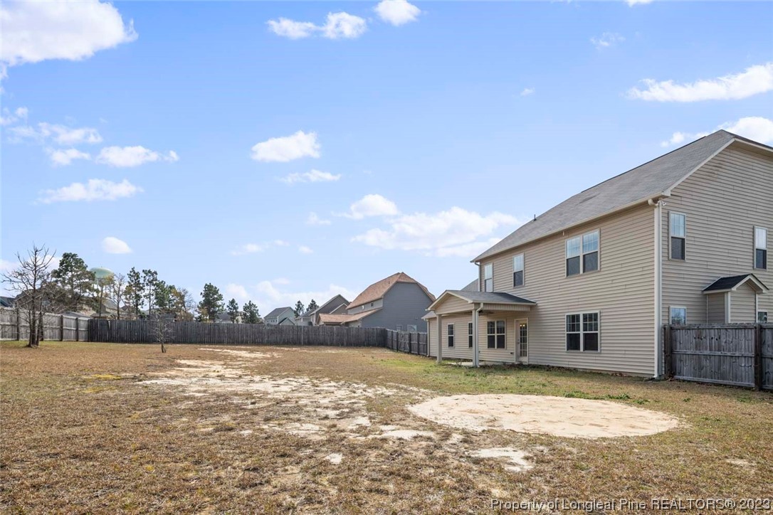 152 Copper Loop Sanford, NC 27332 - Photo 11 of 50 a house view with a lake view
