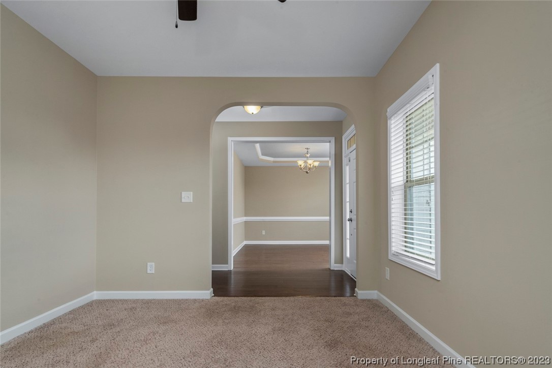 152 Copper Loop Sanford, NC 27332 - Photo 17 of 50 an empty room with windows