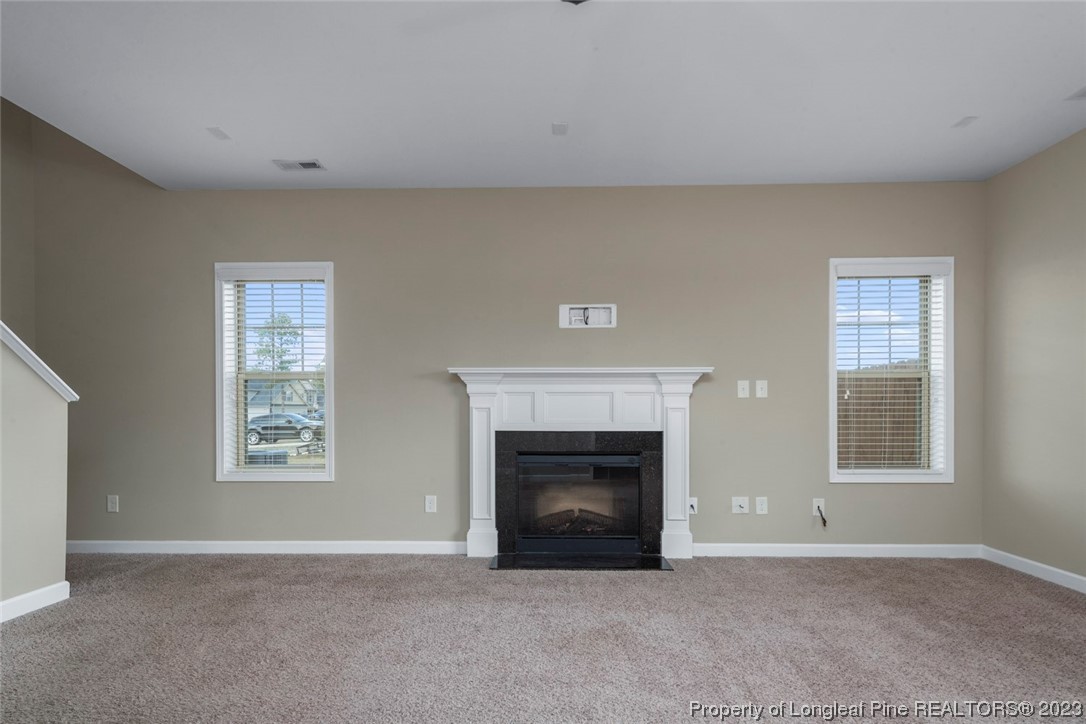 152 Copper Loop Sanford, NC 27332 - Photo 19 of 50 a view of an empty room with a window