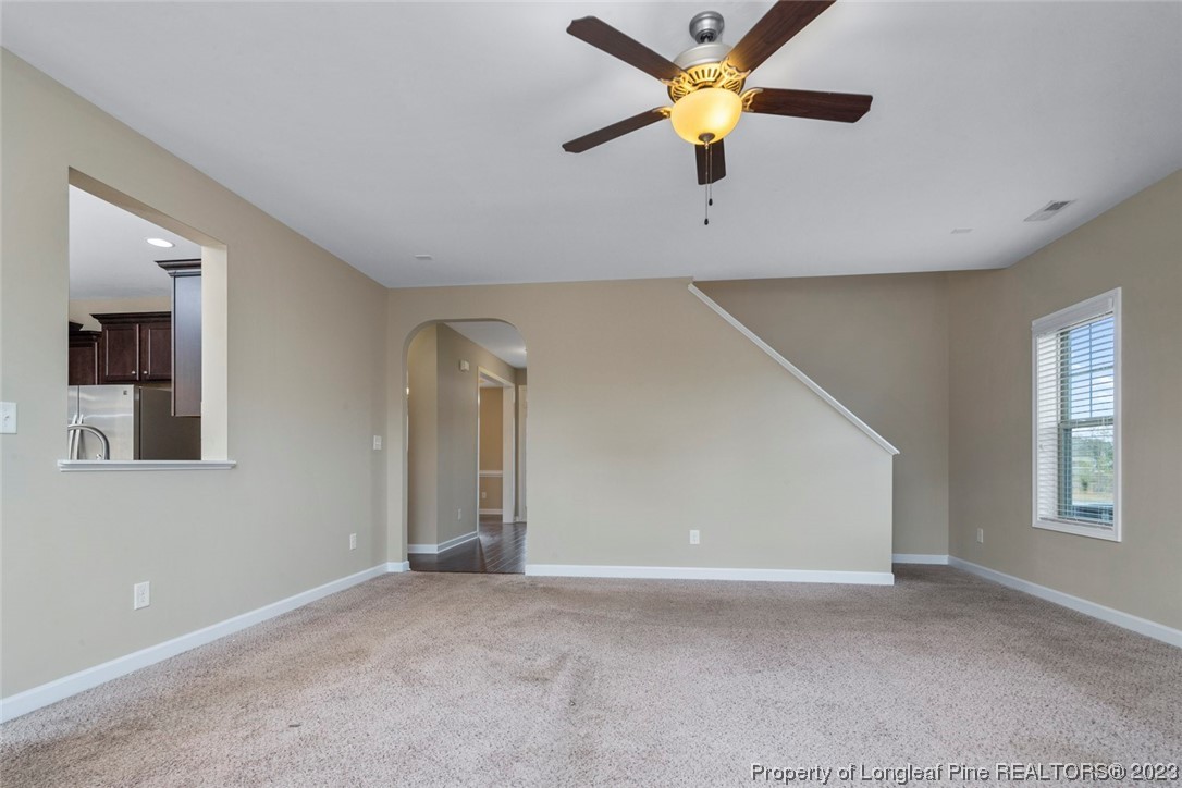 152 Copper Loop Sanford, NC 27332 - Photo 21 of 50 a view of an empty room with a window