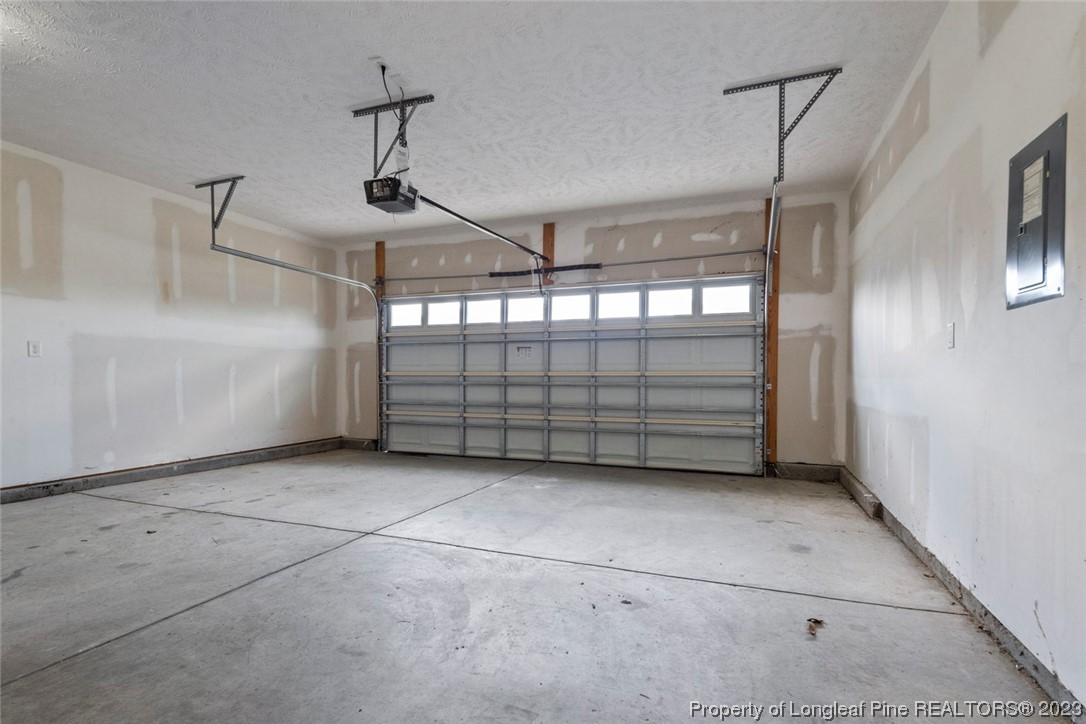 152 Copper Loop Sanford, NC 27332 - Photo 30 of 50 a view of a garage