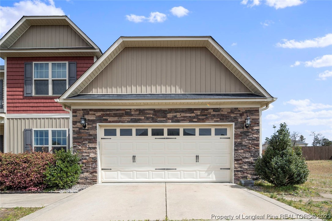 152 Copper Loop Sanford, NC 27332 - Photo 3 of 50 a view of a house with a yard